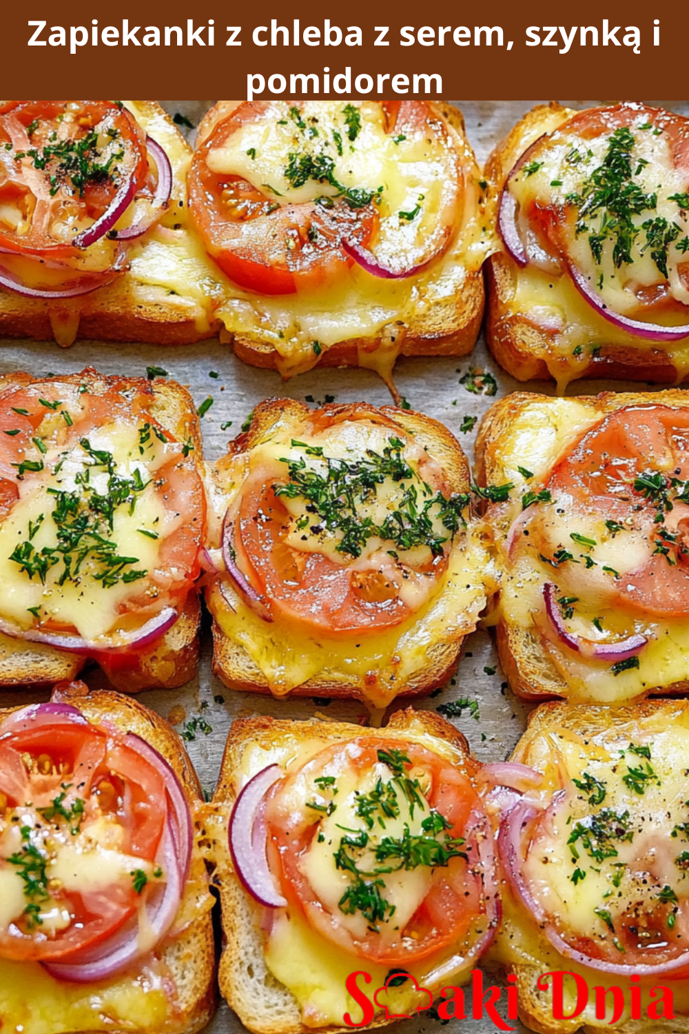 Zapiekanki z chleba z serem, szynką i pomidorem
