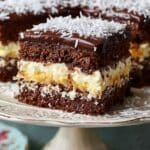 Ciasto Kokosowo-Kakaowe z Kremem Budyniowym – pyszny i efektowny deser 9 Ciasto Kokosowo-Kakaowe z Kremem Budyniowym – pyszny i efektowny deser